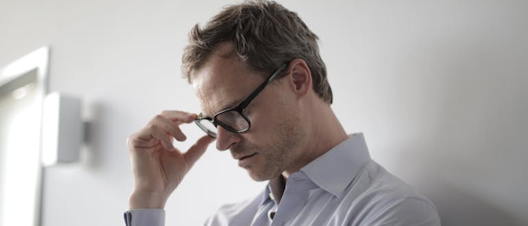 A stressed person thinking about seeking help at alcohol rehab centers in Virginia​