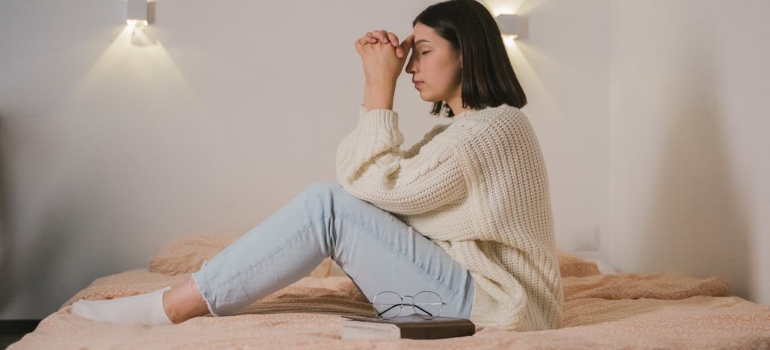 a woman praying 